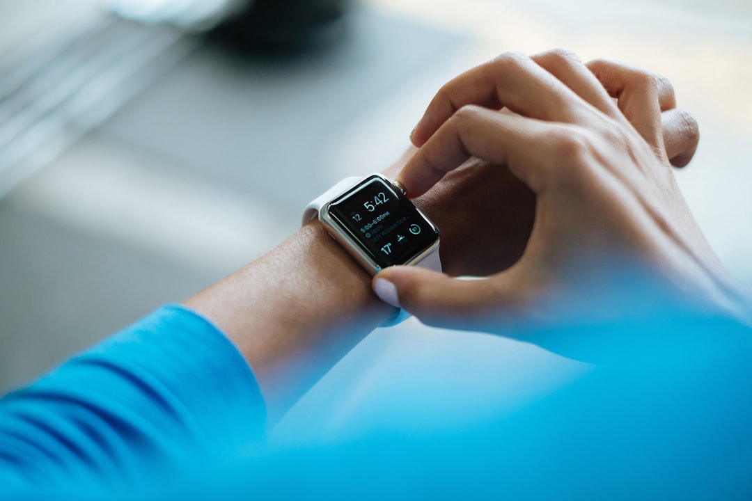 service-04 Young Indian man wearing Apple Watch